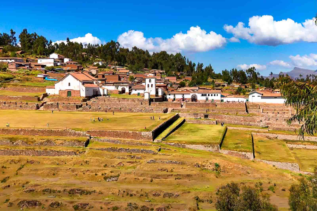 Colorful traditional market in Chinchero with vibrant textiles displayed for sale